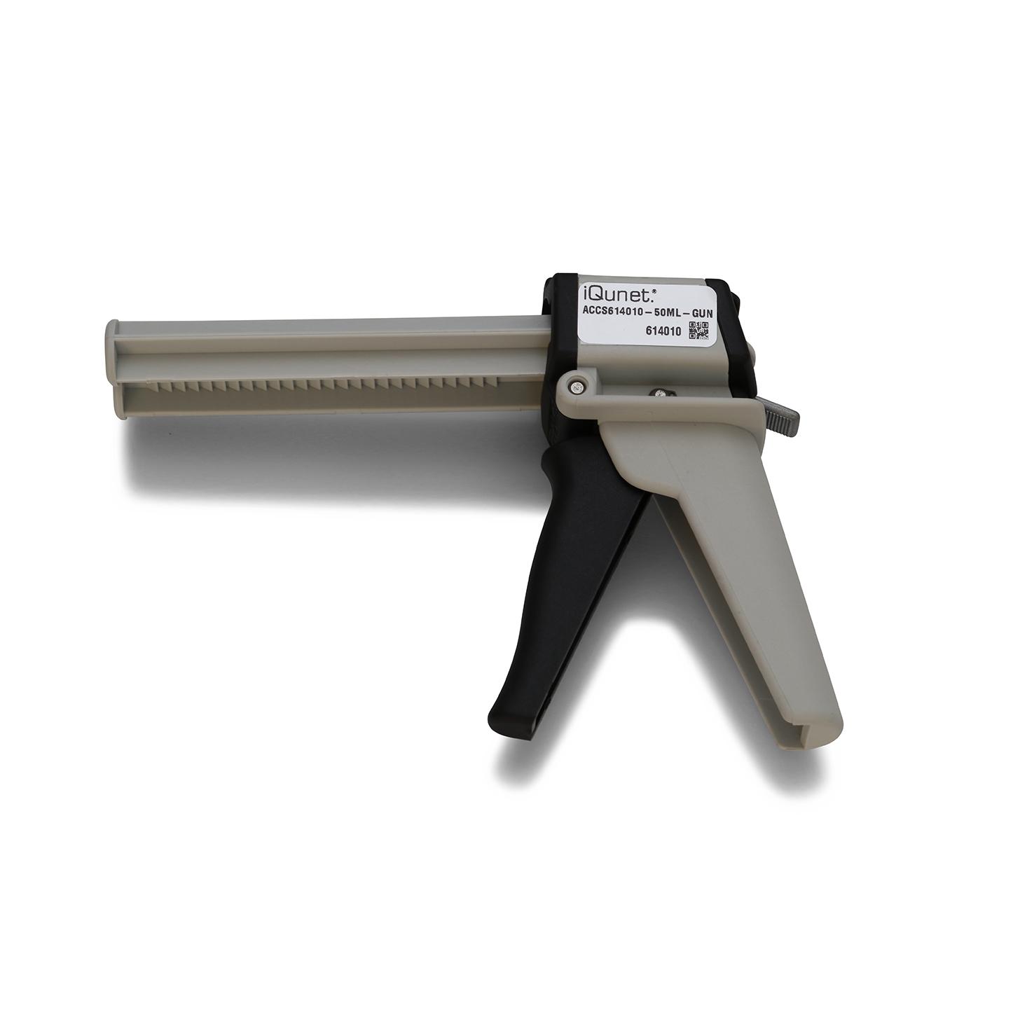 Adhesive dispenser gun